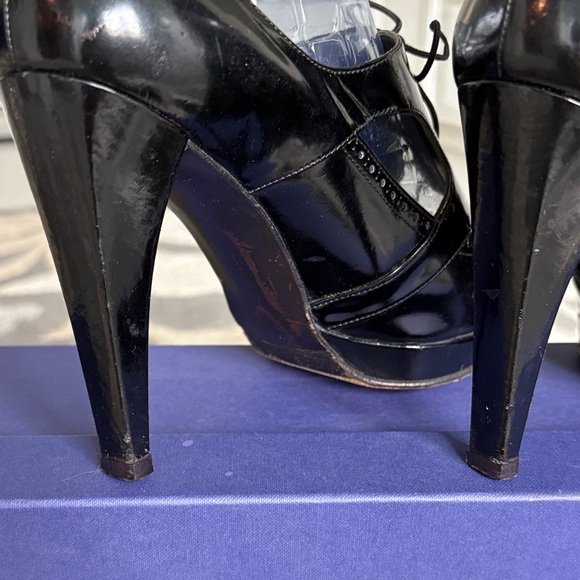 Stuart Weitzman Glossy Black Lace-Up Heels
